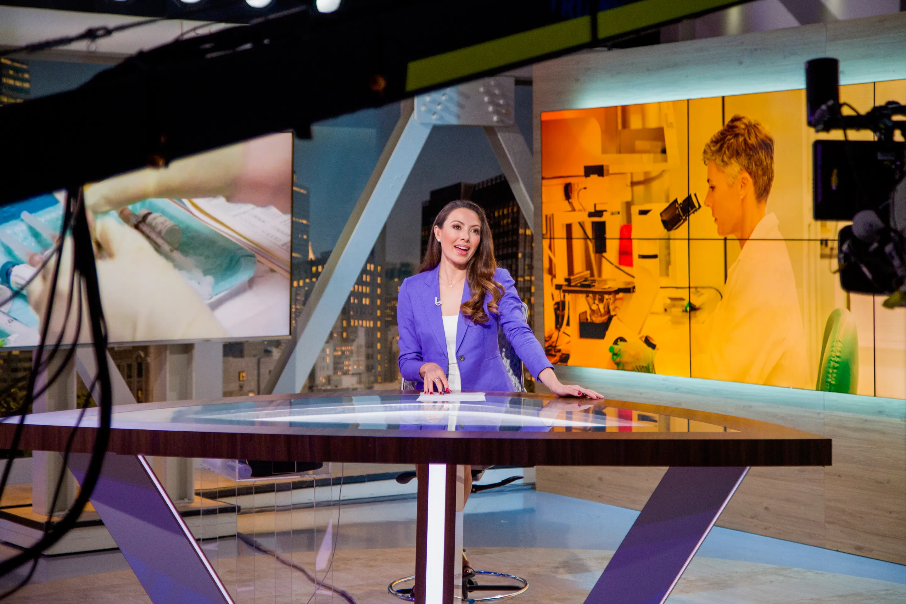 Catalina Villegas in broadcast studio recording the Experts Explain Everything podcast